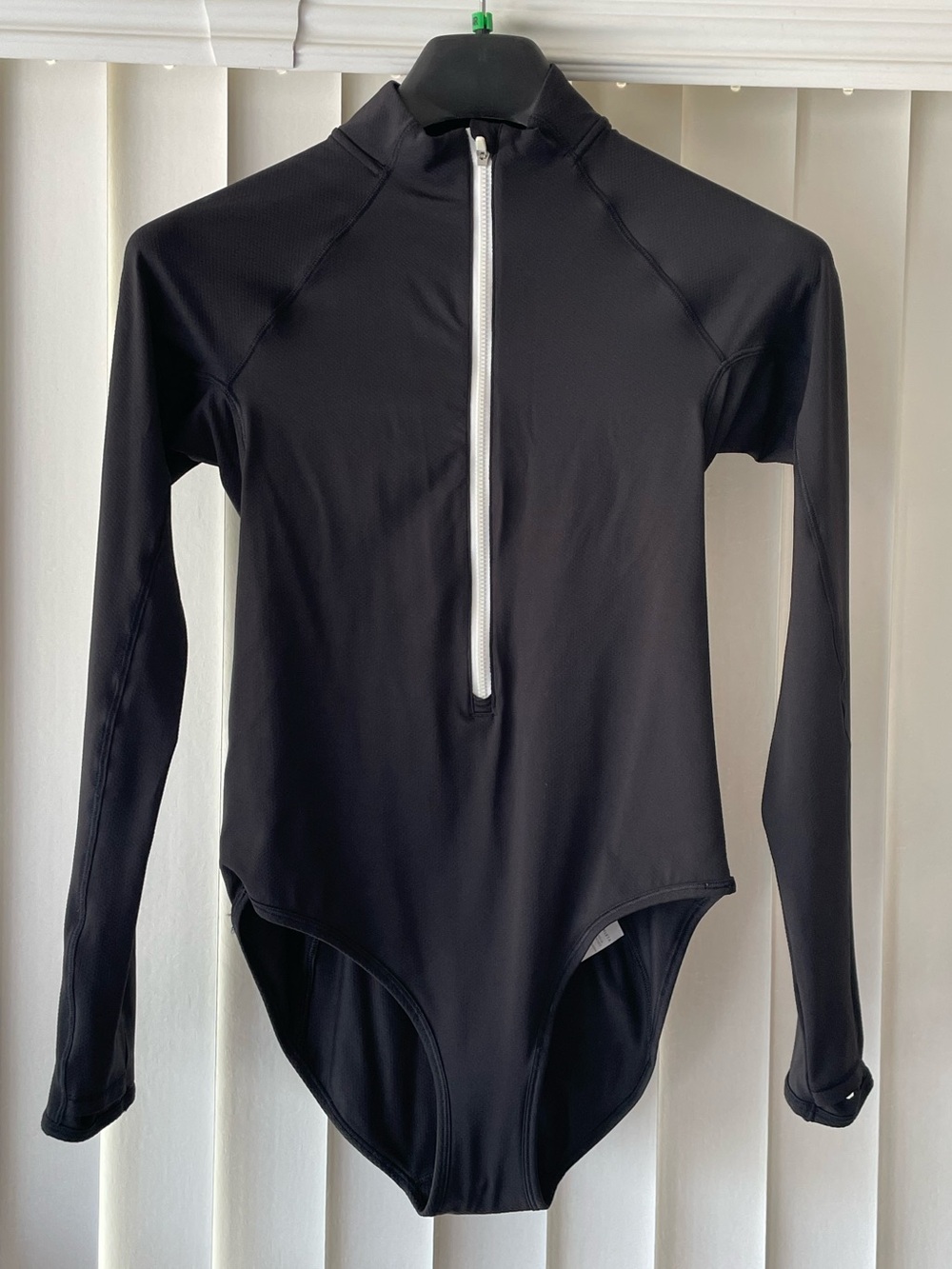 Athleta black Women’s zip front Leotard with long sleeves- size Small